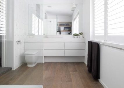 Toronto Bathroom renovation project features installed tiles, floating vanity and flooring