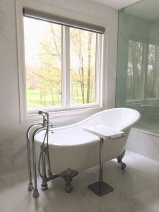 Toronto Bathroom renovation features bath tub installed by window