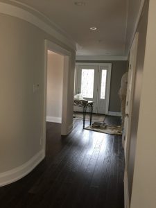 Toronto basement renovation by Milman Design Build, featuring painting work in progress