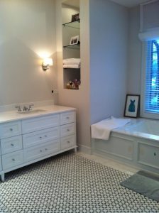 Toronto bathroom renovation showcasing custom vanity, shelves and woodwork