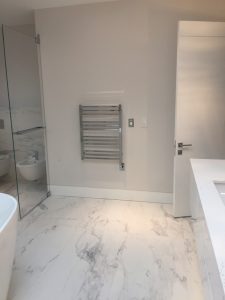 Toronto Bathroom renovation project feature modern white bathroom