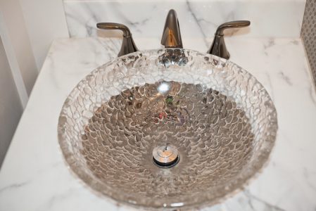 Toronto bathroom renovation project featuring Custom vanity with glass bowl