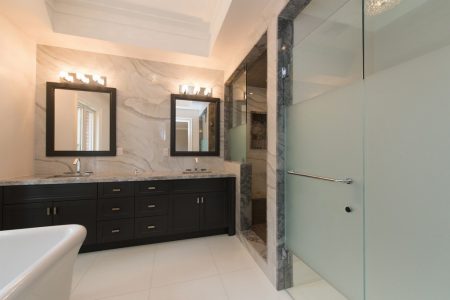 Toronto bathroom renovation project featuring Custom double vanity and enclosed shower
