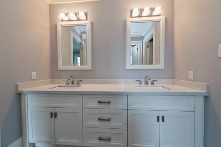 Toronto bathroom renovated with white double vanity