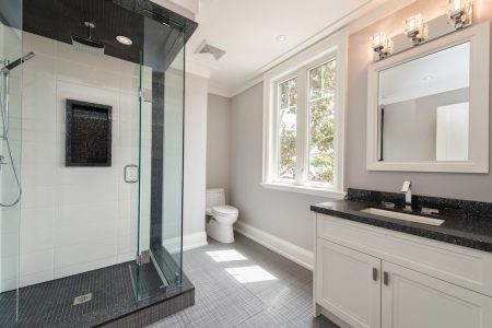 Toronto bathroom renovation with new tiles, fixtures and accents