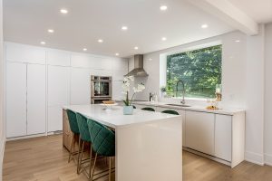 Complete Toronto Kitchen Renovation by Milman Design Build featuring kitchen Island and and White Cabinets