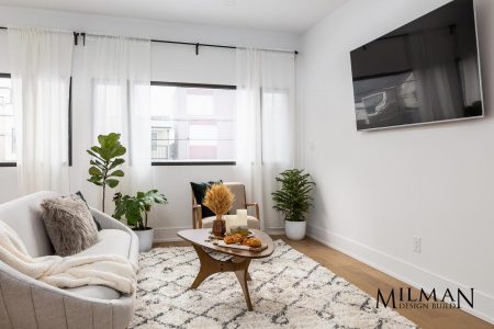 Toronto Laneway Suites Design and Build Project with Spacious Living Room & Large Windows by Milman Design Build