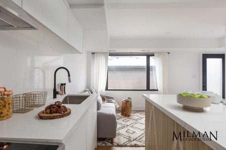 Toronto Kitchen renovations by Milman Design Build Featuring Kitchen & Attached Living Room with Large Windows for Natural Light